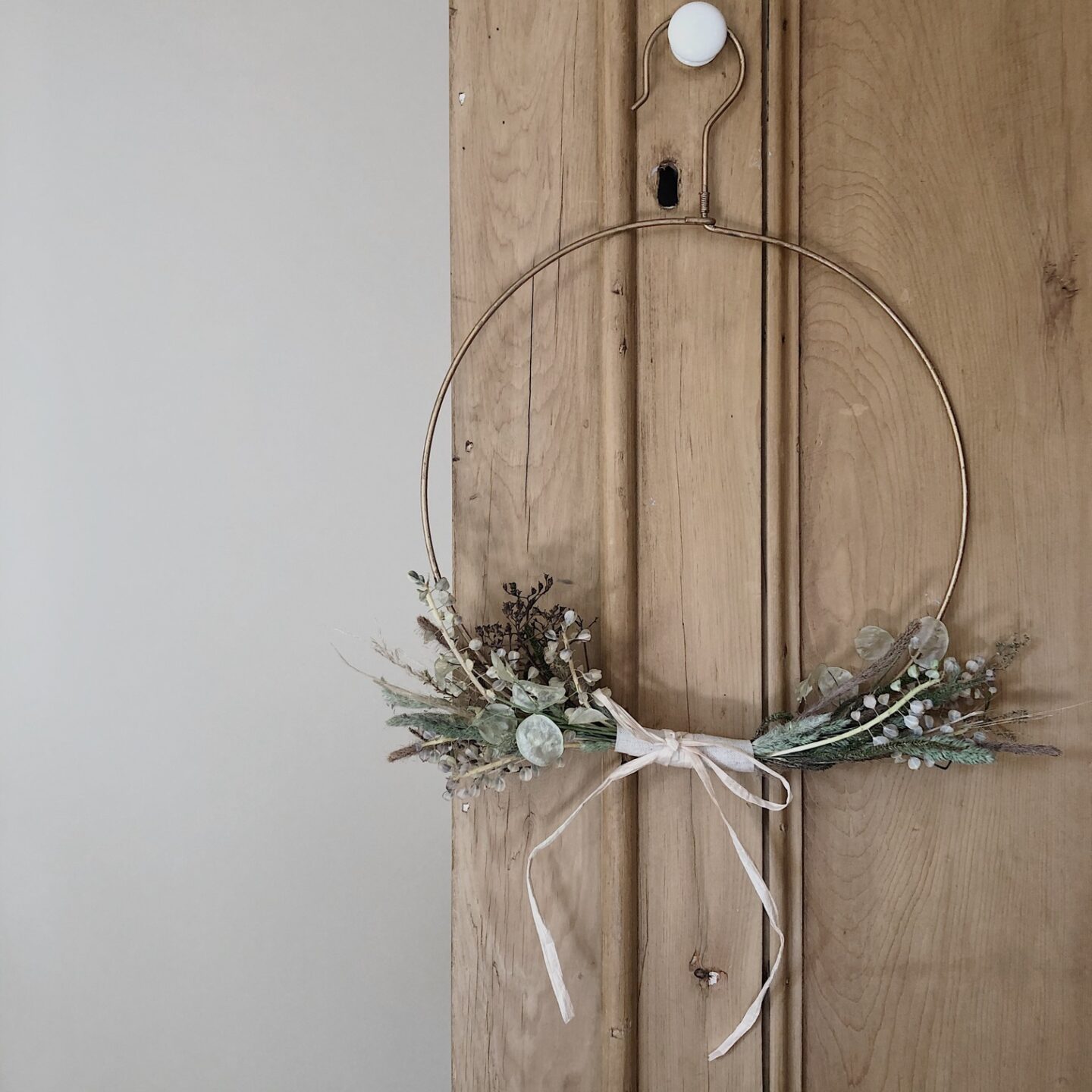 Dried flower wreath on a wire hoop