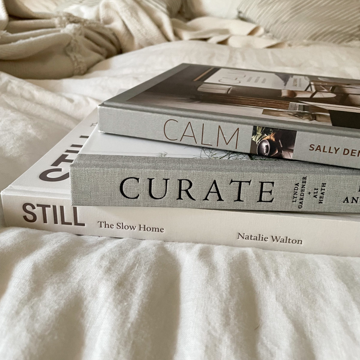 Stack of calm interiors books