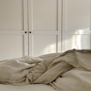 Linen bedding in neutral bedroom