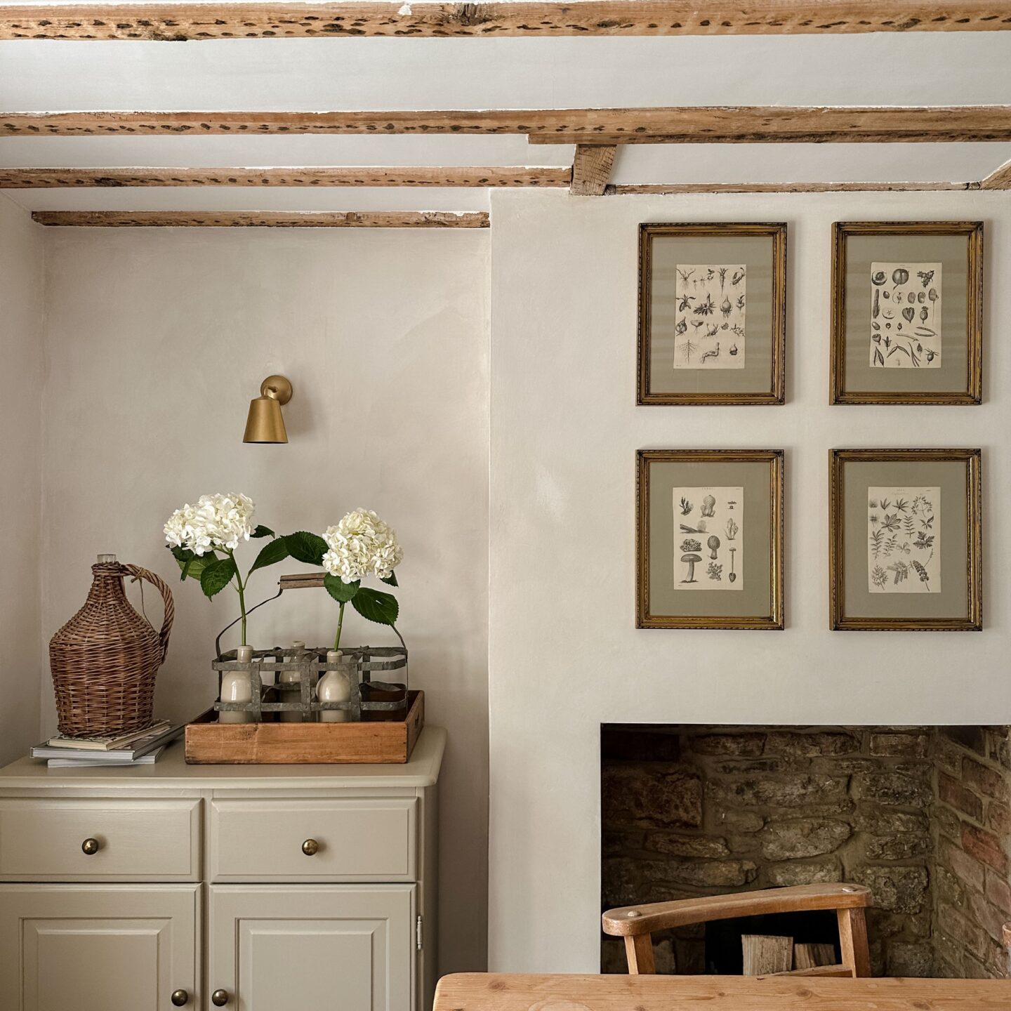 Rustic dining room with hydrangeas in vintage bottles